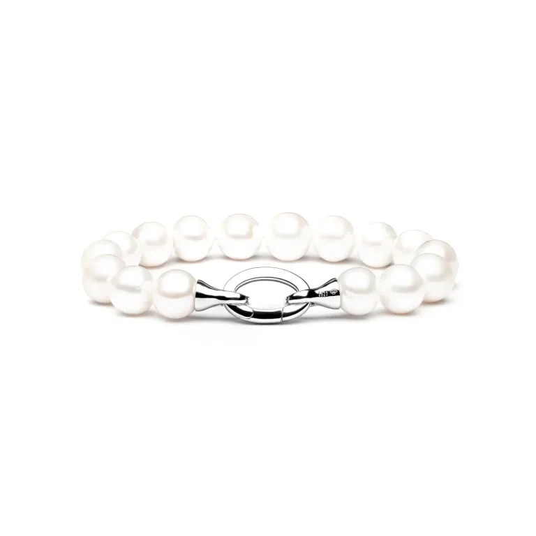 Elegant pearl bracelet with a silver clasp, featuring lustrous white pearls in varying sizes arranged in a delicate design.